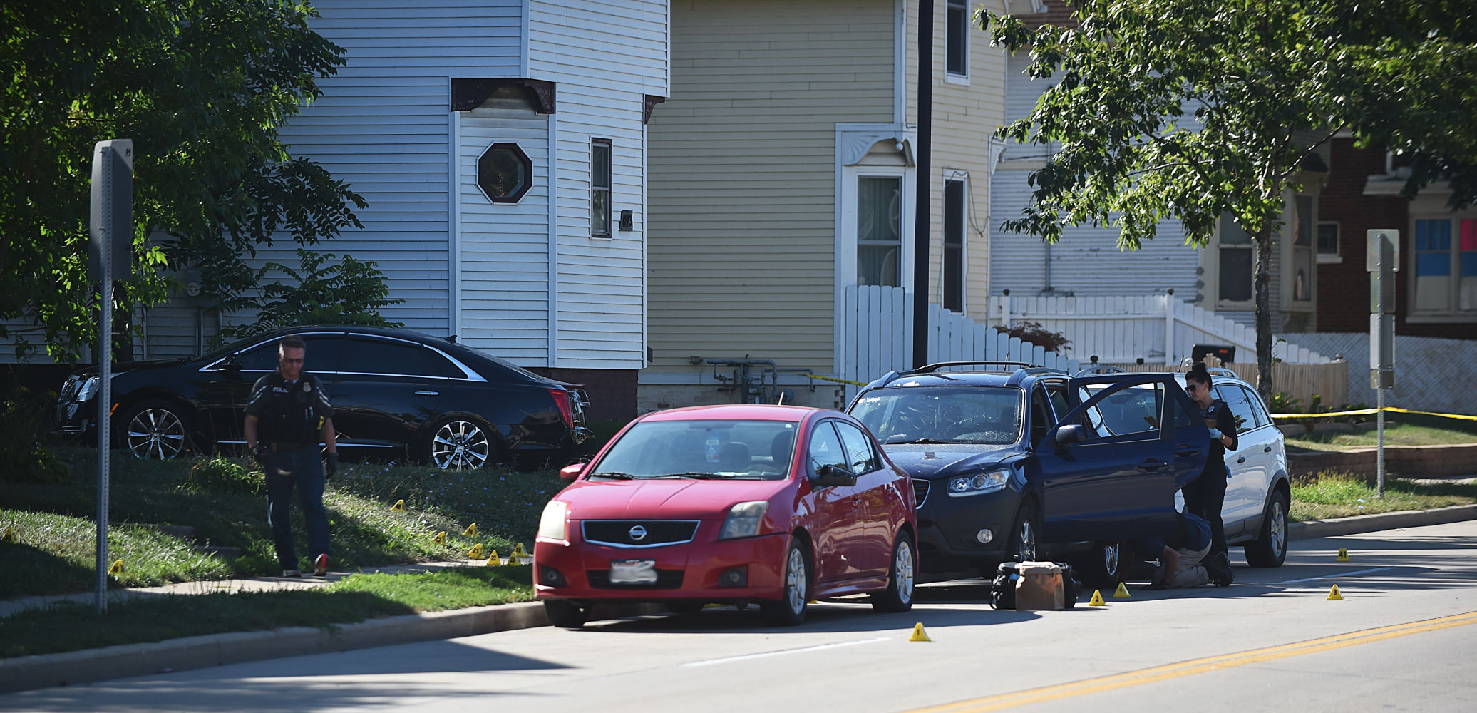 From scene of triple shooting on Racine Street, as of Monday morning